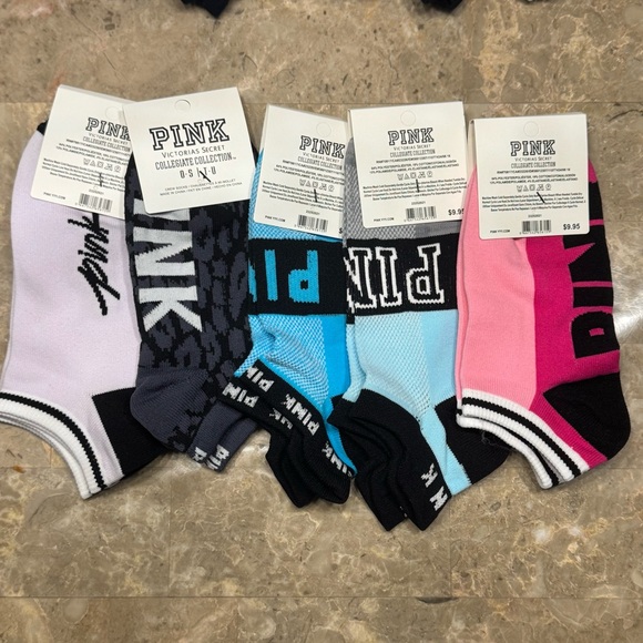 New Pink Victoria’s Secret Socks
With tags 
New Pink socks 
5 pairs included - Picture 2 of 3